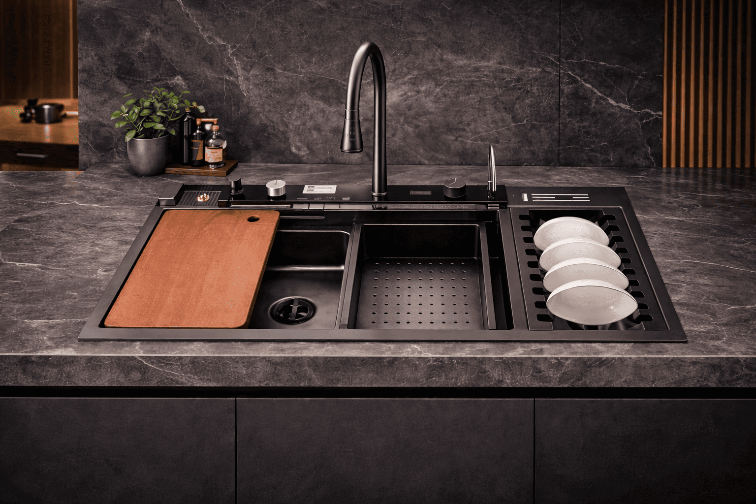Modern kitchen sink with a cutting board and dishes on a dark countertop.