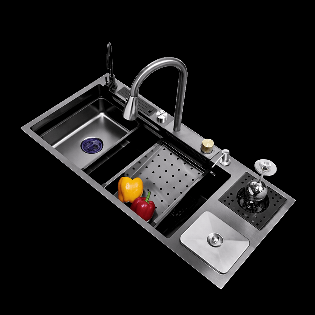 Stainless steel kitchen sink with faucet and various items on a black background