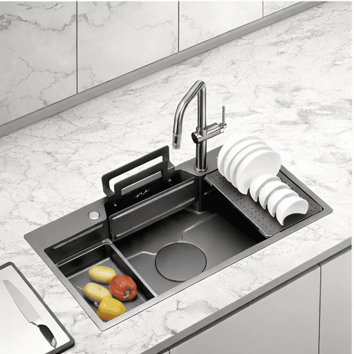 Modern kitchen sink with faucet and fruit on a marble countertop