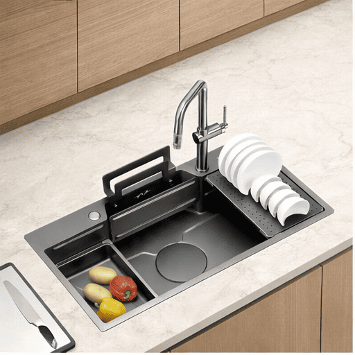 Modern kitchen sink with faucet and dish drainer on a light-colored countertop.
