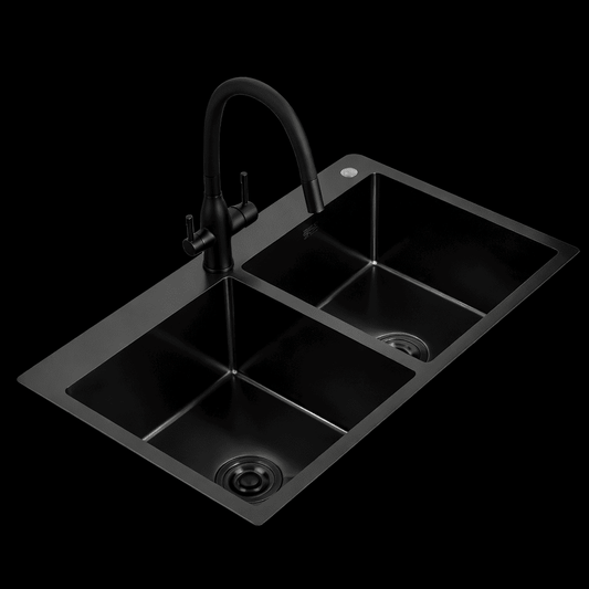 Black kitchen sink with faucet on a black background