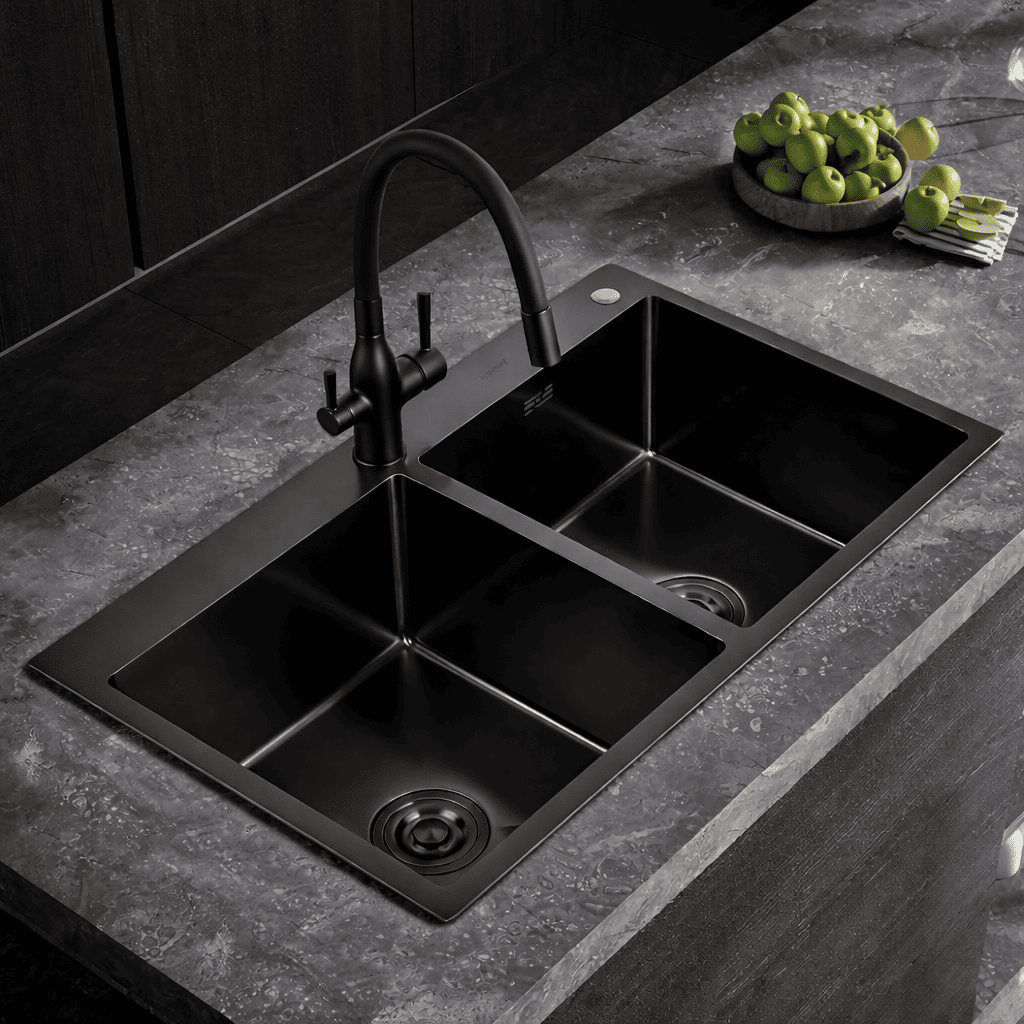 Black kitchen sink with faucet on a gray countertop