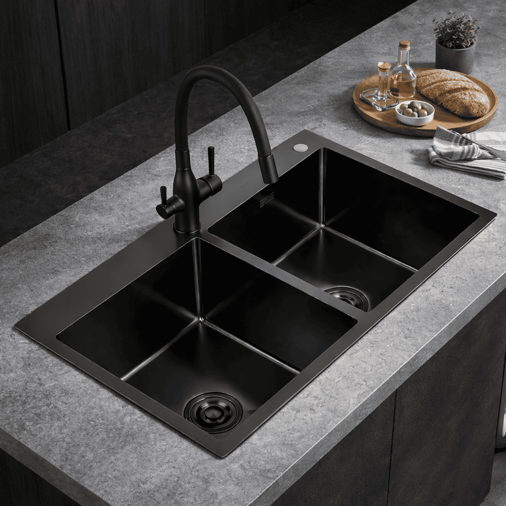 Black kitchen sink with faucet on a gray countertop
